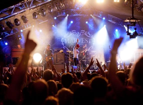 A rock concert on a stage under bright lights
